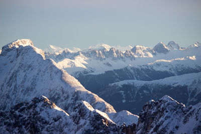 Scenic view of snowcapped mountains against clear sky. layers and layers of mountains.