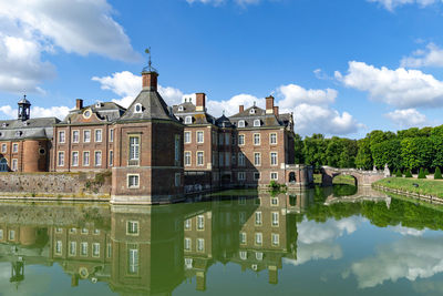 Reflection of buildings in lake