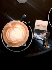 High angle view of cappuccino on table