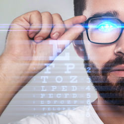 Cropped image of man holding text