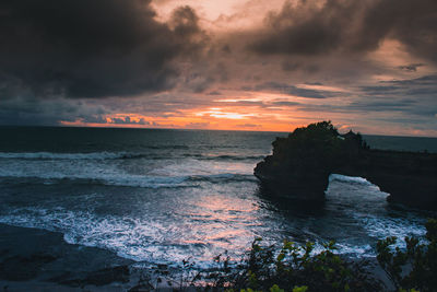 Scenic view of sea against sky during sunset