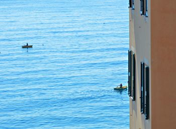 People on boat in sea