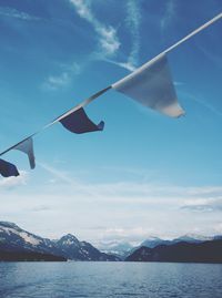 Scenic view of mountains against cloudy sky