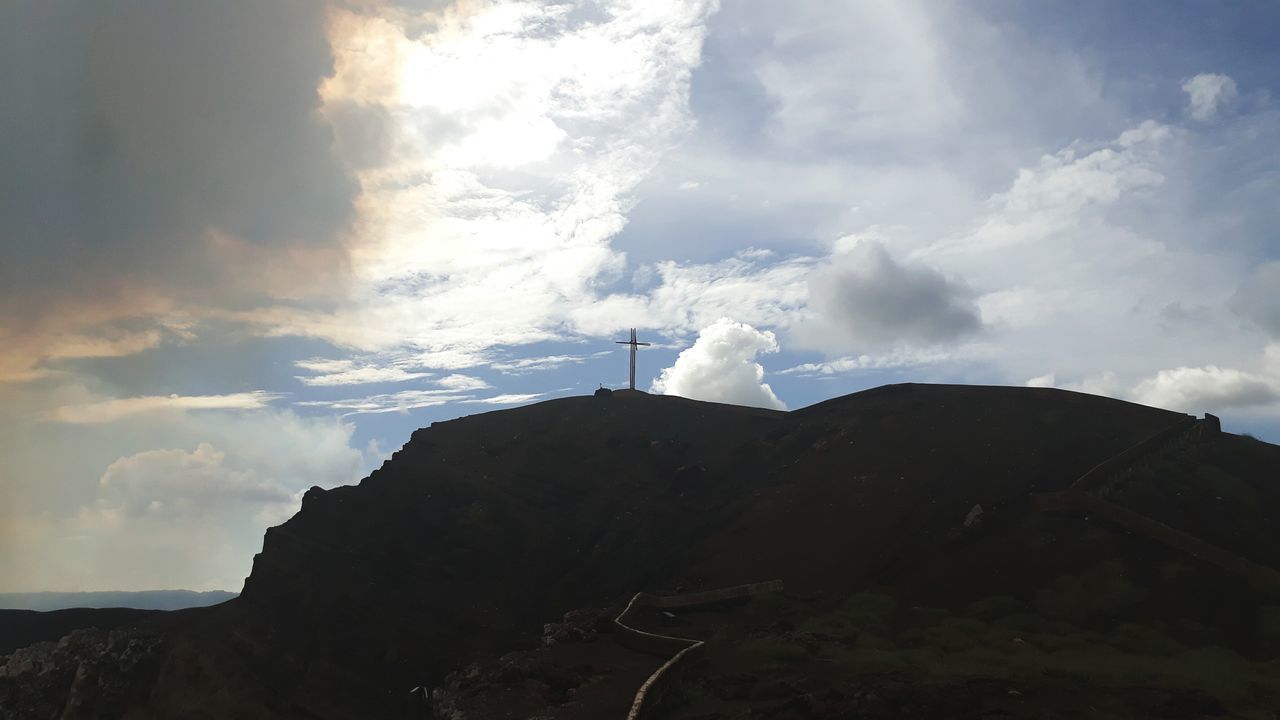 cloud - sky, sky, nature, beauty in nature, day, no people, outdoors, scenics, tranquility, low angle view, mountain, landscape