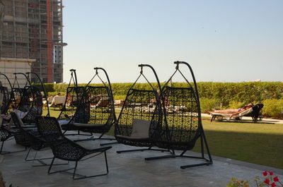 Empty chairs in backyard