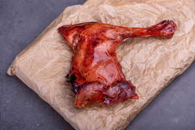 High angle view of meat on cutting board