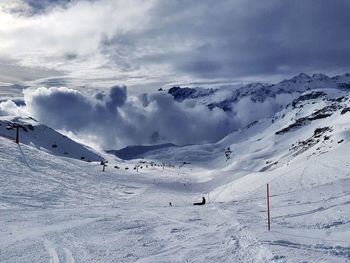 Scenic view of snowcapped mountain against sky