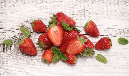 High angle view of strawberries on table