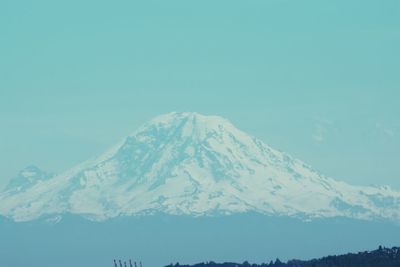 Scenic view of mountains against clear blue sky