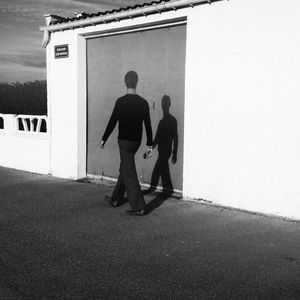 Man standing on wall