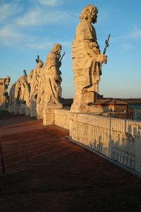 Low angle view of statue against sky