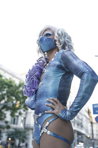 Drag queen standing with hand on hip