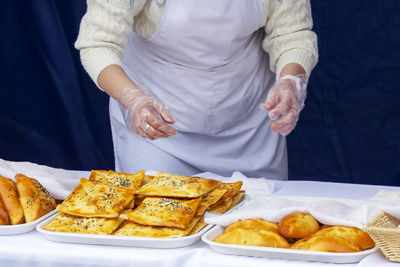 Midsection of man having food