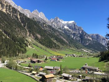 Scenic view of landscape and mountains against sky