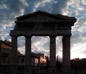 View of historic building against cloudy sky