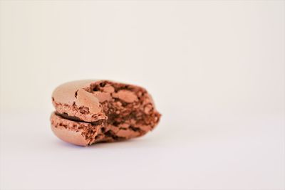 Close-up of chocolate over white background