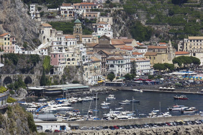 High angle view of boats moored at harbor