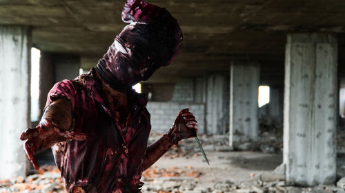 Man wearing spooky halloween costume