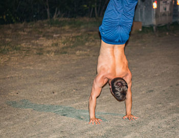 Full length of man running on road