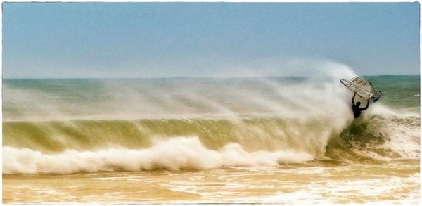 Waves splashing on beach