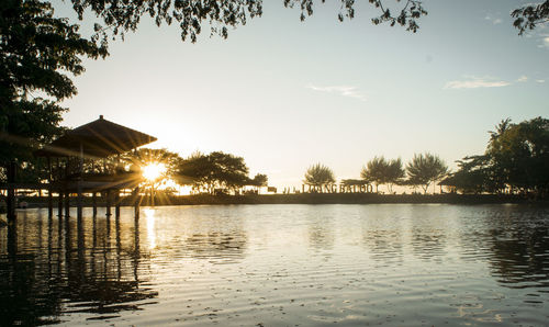 Scenic view of beach against sky during sunset