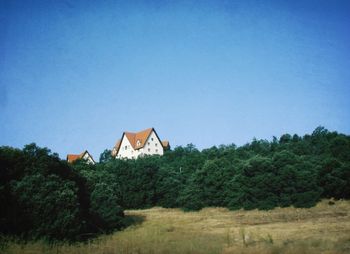 View of built structure against clear blue sky