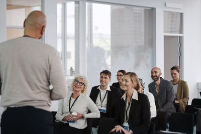 Business people sitting during business meeting