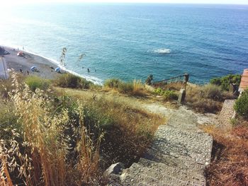 High angle view of sea shore against sky