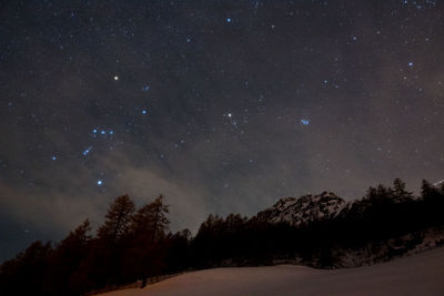 Low angle view of star field against sky