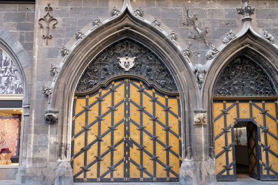 Historic door with munich kindl of new munich city hall