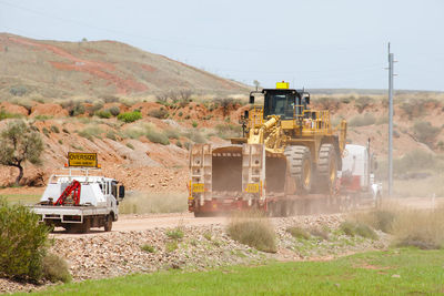 Construction site on field against sky