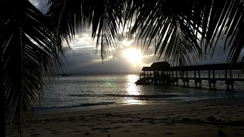 Scenic view of sea against sky at sunset