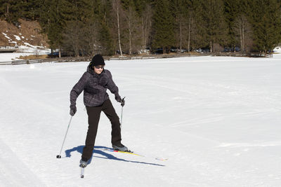 Full length of man on snowy field