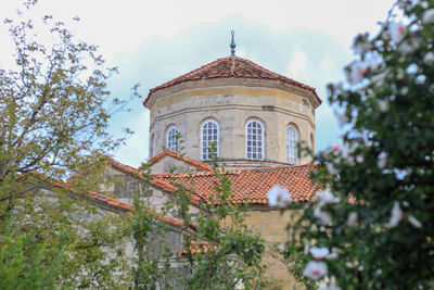 Low angle view of old building against sky