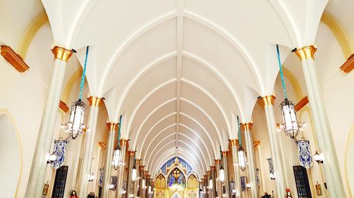 Low angle view of illuminated ceiling in building