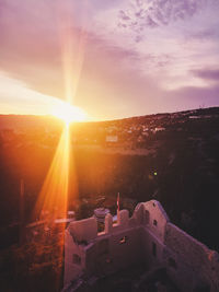 High angle view of townscape against sky during sunset