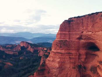 Scenic view of rocky mountains against sky