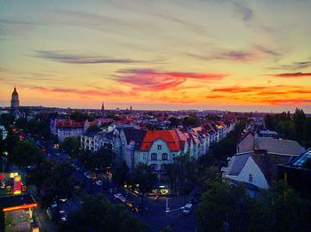 High angle view of illuminated cityscape at dusk