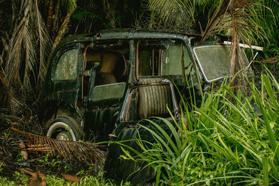 Abandoned truck on field