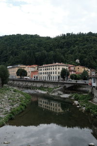 Bridge over river against sky