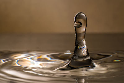 Close-up of drop splashing in water