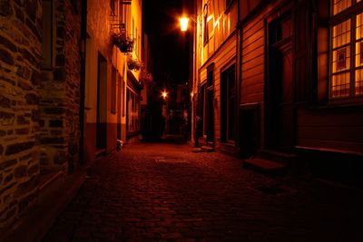 Illuminated street at night