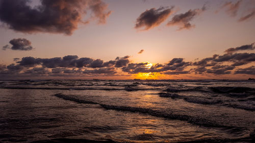 Scenic view of sea against sky during sunset