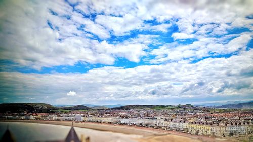 Aerial view of townscape against sky