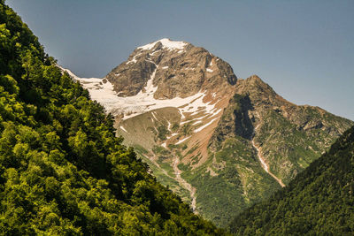 Scenic view of mountains against clear sky