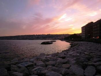 Scenic view of sea against sky at sunset