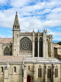 Low angle view of historic building against sky