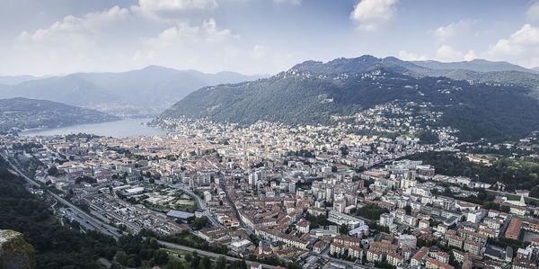 Panoramic view of people in mountains against sky