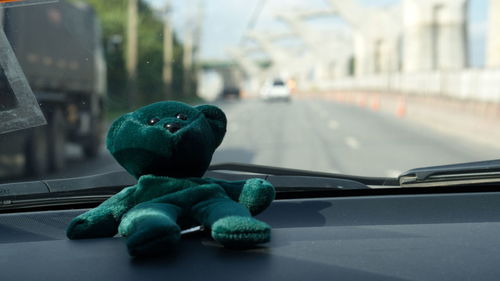 Close-up of toys in car