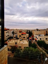 High angle view of buildings against sky